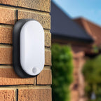 Eco Outdoor LED Bulkhead Light with PIR Motion Sensor, Decorative Exterior Lighting, Oval, Black, IP54, 10W, 700lm, 4000K, EBEO10P40